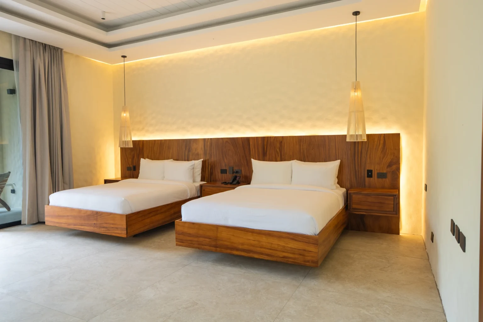 Two queen beds in the One Bedroom Vista Arenal bedroom